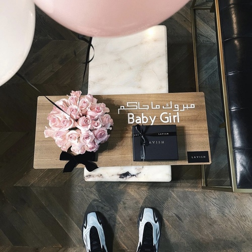 Baby Girl Board - Baby Girl Board contains 25-30 roses with two pink balloons.  with 200g of Lavish chocolate