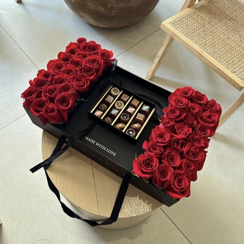 Lavish Flowers - L100 - L100 design contains 48-55 roses  and Lavish chocolate 200grams.