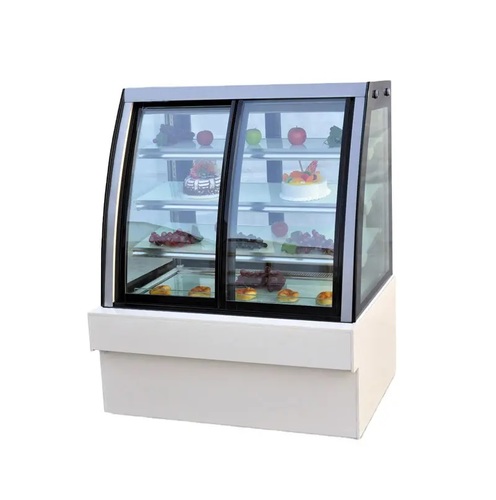 Owjar - Cake Showcase cooler Curved -1200m #957 - Dimensions:1200*850*1490mm 
℃Temp: 4~10
Volts:220v/50Hz
Power: 800/1200W
الوزن :150kg
Refrigerant: R134a
 Capacity:150L
 Brand Western Touch