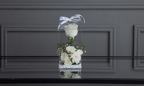 Elsy - This bouquet contains big rose, baby rose, wax flower and confern leaves.
Height: 23 cm, Width: 10 cm