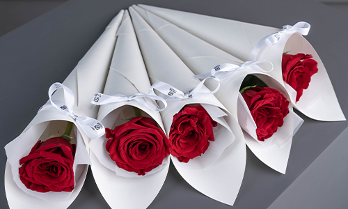 Single Roses in White - Five roses in red color wrapped separately with white wrapping