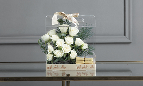 Eros Bouquet - A basket contains baby roses, confern leaves and baby eucalyptus with Belgian chocolates.
Height: 22 cm, Width: 20 cm