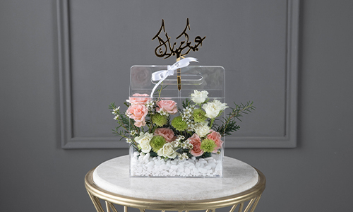 Ruggy - The bouquet contains baby roses, green button and wax flowers.
Height: 23 cm, Width: 20 cm