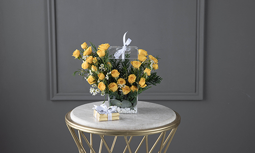 Derba I - The bouquet contains baby roses, wax flowers and confern leaves with Belgian chocolates.
Height: 22 cm, width: 10 cm