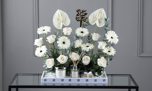 Zulian - A tray contains gerbera, anthurium, big roses, eucalyptus and
  confern leaves  with Belgian chocolate,
  diffuser and candle..

    Height: 50 cm, Width: 48 cm