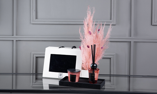 Graduation Gift 5 - A special gift of candle and diffuser in a box with a flower arrangement that contains corthadelia and mix of leaves.
Height: 50 cm, Width: 37 cm