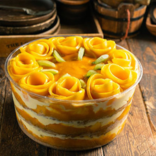 Mango trafal large - With our special mix with mango sauce, topped mango fresh, family size.