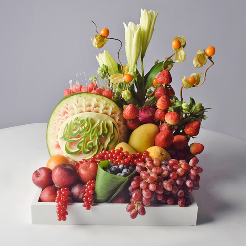 fresh mix - fresh
  watermelon carving with mixed fruits and fresh flowers.