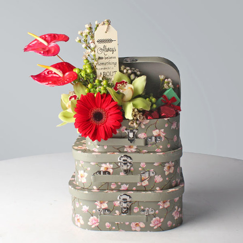 Mon Amoure 18 - 3 layer box of Kuwaiti sweets (inside) decorated with anthurium, gerbera, hypericum, cymbidium flowers and chocolates with wood frame.