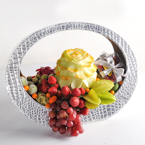 Rose Fruit Basket - Basket with rose carved sweet melon and different kinds of fruits.