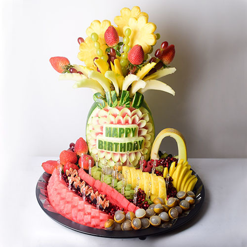 Happy Birthday Fruits - Fruits cut and carving with edible arrangement.