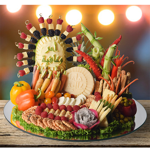 cheese tray 3 - cheese tray with costumized carving , fruits, vegetables and bread