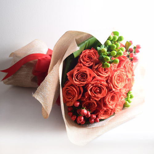 al rabeea 9 - Bouquet
  of fresh orange roses flowers.