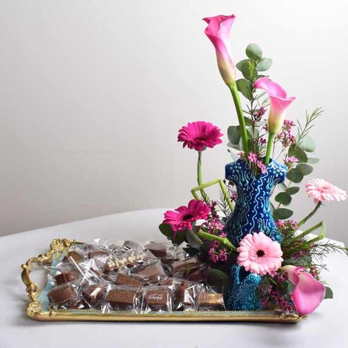 Asakum min Awada4 - Mirror tray decorated with natural calla, gerbera and wax flowers
  containing chocolate