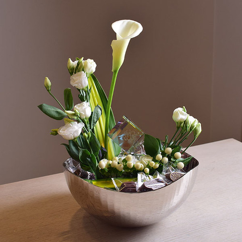 eid adhha & haj mabror 9 - silver
  tray with crystal Kabah, chocolates and a decoration of fresh calla,
  lisianthus and hyphericum flowers.