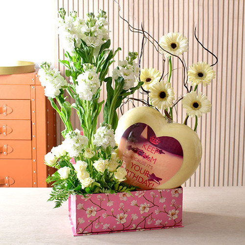 Fresh Couture - someone special 10 - Big
  Heart white chocolate for Birthday with a decoration of fresh matola, gerbera
  and roses.