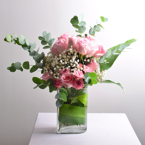 my flower 1 - glass
  vase with fresh roses and gypsophilia flowers with eucalyptus leaves.