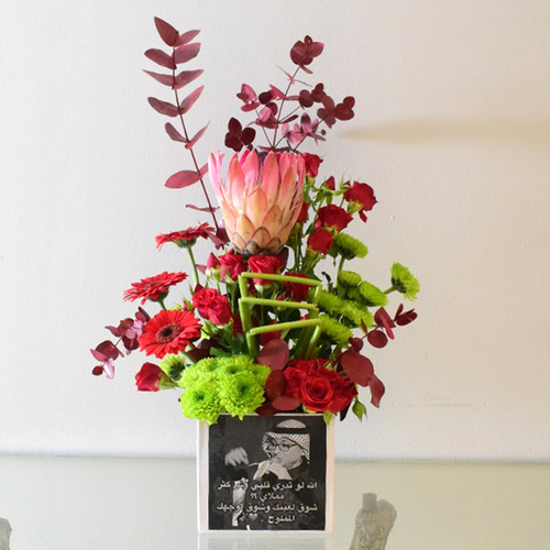 Tetnafasek denyay 1 - Costumized
  Box of fresh Gerbera, Baby rose, Chrysanthimun, and Protea Flowers.