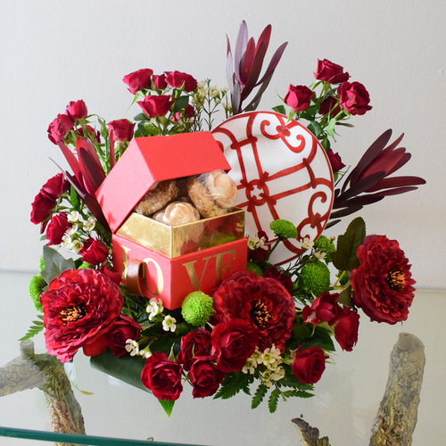 2026 - LOVE - Love box with roses chocolates with ceramic plate, decorated w/fresh Red flowers like baby roses. , safari sunset, Ranaculus, Wax flowers, and chrysanthinum button