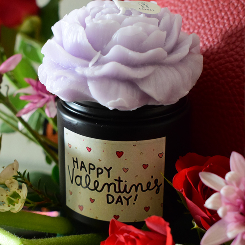 2026 - LOVE 2 - Valentines
Day Gift tray with 1 acrylic box of chocolates, 2 scented candle, 1 heart
shape leather bag, decorated with fresh red gerbera, roses, ranaculus and
pink chrysanthemum flowers.