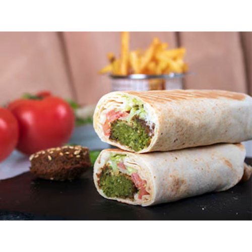 Felafel Sandwich (Meal) - Falafel, lettuce, tomato with tahina sauce served in arabic bread with chips and salad.