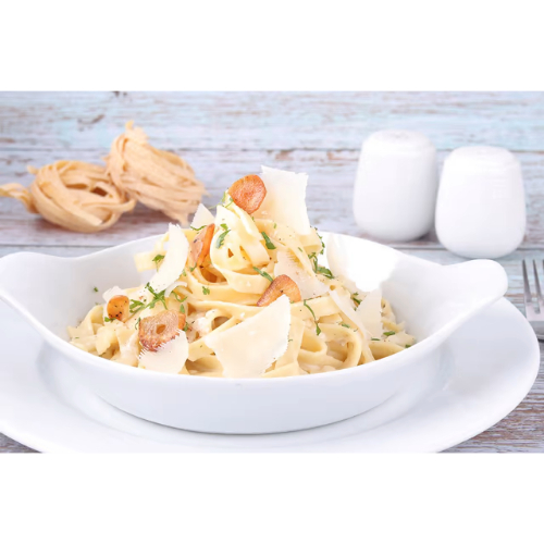 Fettuccine Alfredo - Silky
  fettuccini enveloped in a classic creamy parmesan sauce.