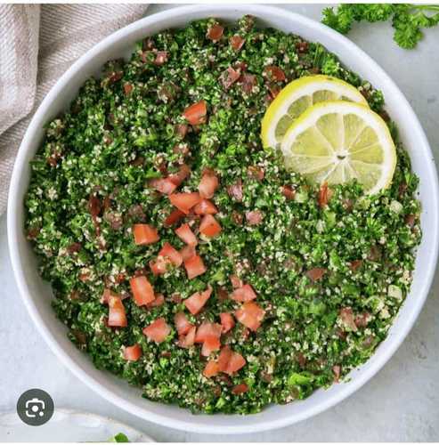 Tabbouleh Salad - A refreshing mix of parsley, mint, tomato,
  onion, and bulgur, seasoned with lemon juice and olive oil