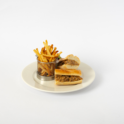 Steak Sandwich - Sliced
  steak, caramelized onions, and creamy mustard sauce on a toasted baguette. Served with fries on the side.