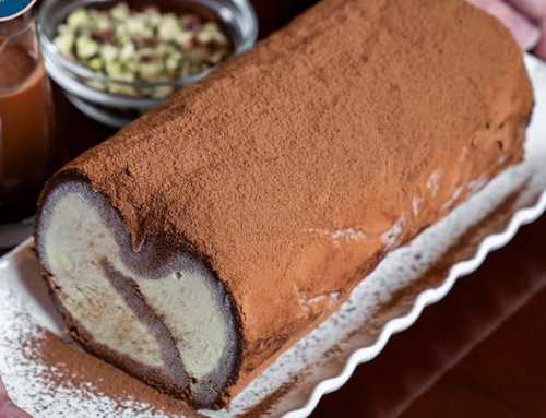 Swiss Roll Ice Cream ( Vanilla) - Swiss Roll Ice Cream a frozen dessert consisting layered vanilla flavor of ice cream wrapped inside the soft sponge cake to form spiral