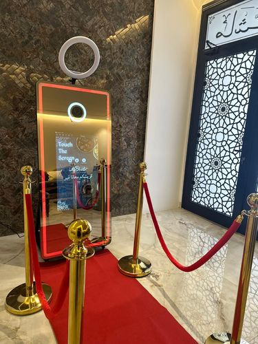 Package 2 - Offer 2: 180 KD
 Duration: 3 hours
 65 inch mirror/ 32 inch screen
 Special template for background design and image template
 Red color carpet/ 4 golden columns
 Sending photos by email (unlimited number)
 Print 100 photos Party props
 Ring Light/ Background