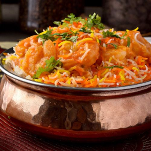 Mum Shrimp Biryani - shrimps cooked meticulously with Indian herbs yogurt and long grain saffron flavored basmati rice