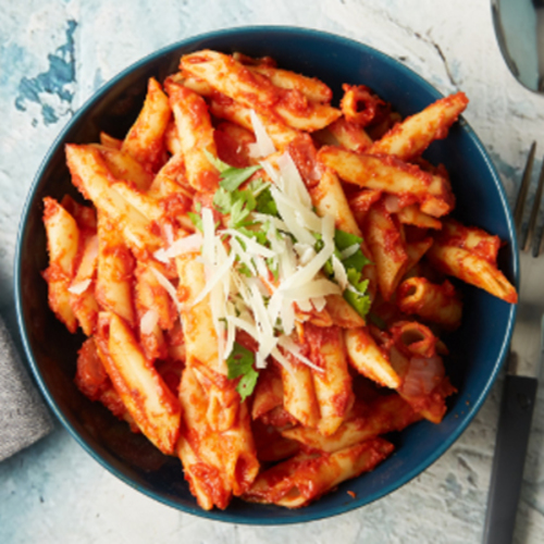 Penne Al Arrabiata Pasta - Penne pasta mixed with our signature light spicy arrabiata sauce topped with parmesan cheese.