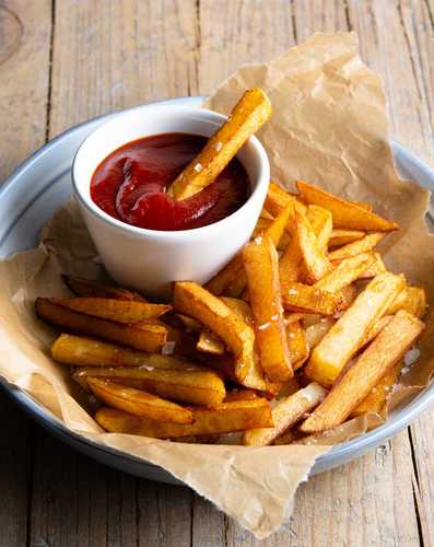 French Fries - A thin strips of potato that are deep fried until they are golden brown, and crispy.