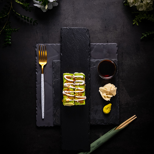 Caterpillar maki - Caterpillar maki- Shrimp tempura, avocado & sesame seeds wrap with top Teriyaki sauce, spicy mayo & tartar sauce.
