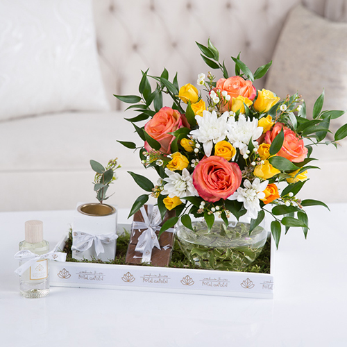 Skylar - Big roses, baby roses, chrysanthemum, wax flowers, rascust green, flot moss, Belgian chocolate, perfume and mubkhar.