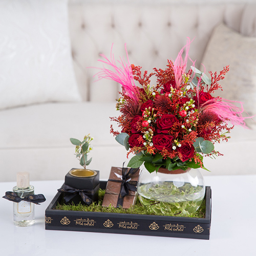 Maya - Baby roses, wax flowers, eryngium, solidago, eucalyptus, strapya pink, Belgian chocolate, perfume and mubkhar.