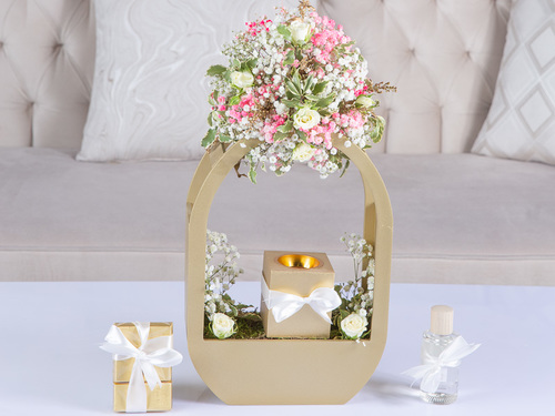 Katrina - The Arrangement Contains Baby Roses, Gypsophila, And Double Color Leaves, With Perfume, Mubkhar And Belgian Chocolate.