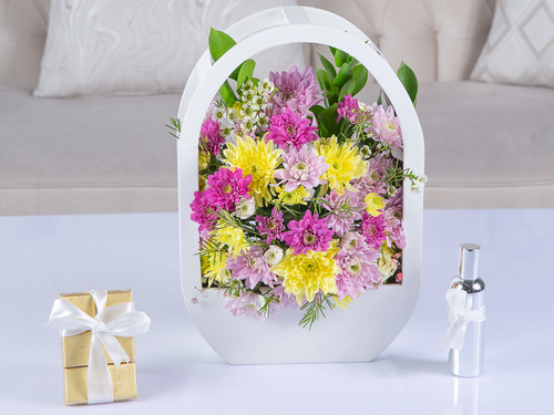 Francesca - The Arrangement Contains Chrysanthemum Flowers, Wax Flowers, And Italian Ruscus With Perfume And Belgian Chocolate.