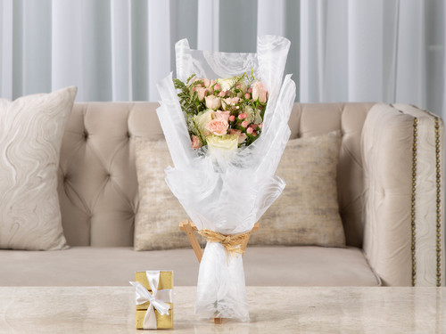 Butterfly - The arrangement contains mix of flowers, hyprecum and leaves with Belgian chocolates.
Height: 48 cm, Width: 30 cm