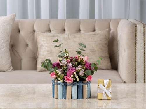 Berries - The arrangement contains a mix of flowers and eucalyptus with Belgian chocolates.
Height: 18 cm, Width: 16 cm