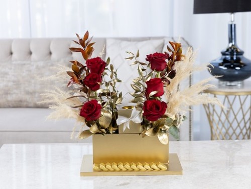 Randy - The bouquet contains roses, ruscus and dried leaves with Belgian chocolates and Mubkhar
Height: 45 cm , Width: 35 cm