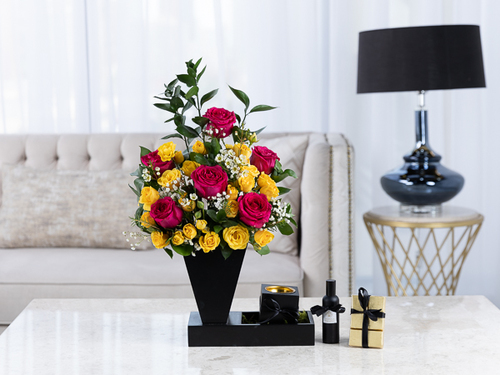 Rumer - The bouquet contains a mix of flowers, wax flowers and ruscus in addittion to a Belgian chocolate, mubkhar and perfume.
Height: 50 cm , Width: 30 cm