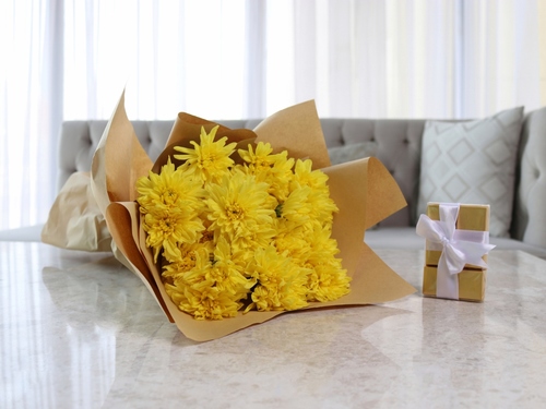 Dario - This bouquet contains chrysanthemum flowers with Belgian chocolates.