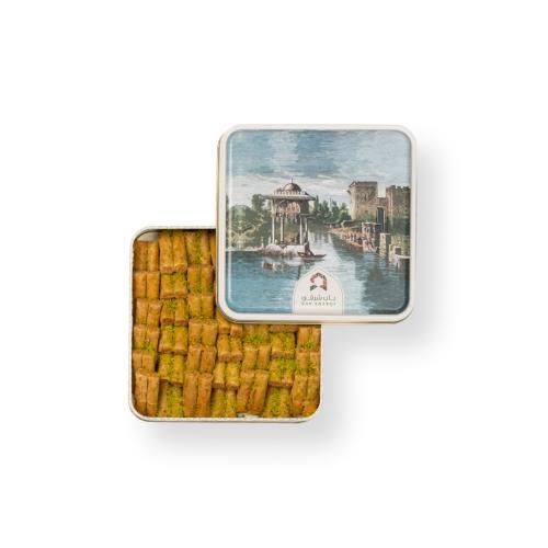 Baklava fingers with cashews, medium size, Bab Sharq - Layers of crispy golash rich in luxurious cashews with a sprinkle of green pistachios (small size). Weight:350 grams. Packaging: luxury...