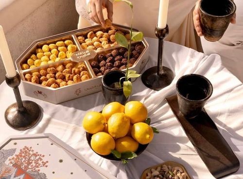 Assortment of stuffed petit fours with an Arabic flavor - New selection of stuffed petit fours, with four distinctive flavors: lemon, chocolate, cream, and caramel.