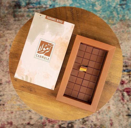 Caramel Bites Caramola - Caramel Bites 
 Composed of a crispy biscuit base, topped with a rich caramel layer, and finished with a layer of chocolate. 270g, 32 pieces