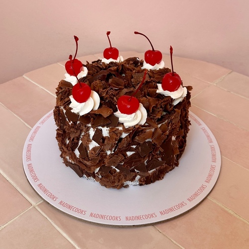 BLACK FOREST - Chocolate sponge cake, white choco mousse topped with maraschino cherries