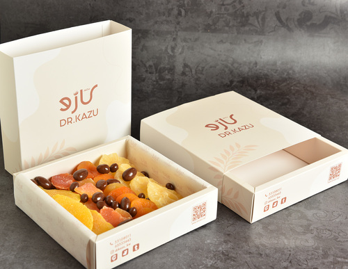 A box of dried fruits with healthy chocolate