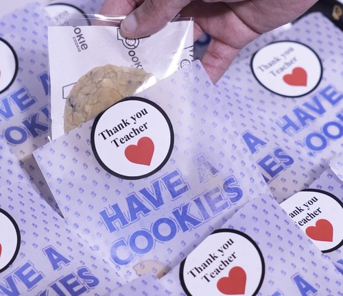 teachers day - Giveaway cookies, you can choose any kind of cookies, or choose mix for all kinds, it comes with stickers with the caption you choose. please write the caption (English or Arabic) down in (leave your message) box