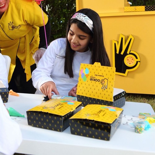 kids catering - Our kids' station is a 2-in-1 dessert catering and activity station will keep your kids entertained by serving the followings:&nbsp;&nbsp; 1- Baking different shapes of cookies and decorating the shapes by using colorful icing sugar and different kinds of toppings (2 cookies per child). 2- Serving 1 pizza cookie or 1 waffle for each child.
 3- Enjoying drinks: (milk chocolate and water). 
 
 It comes with setup and decorations: 1- our ookie station and one or two servants.&nbsp; 2- kids size chairs and tables. 3- one balloon on each chair.